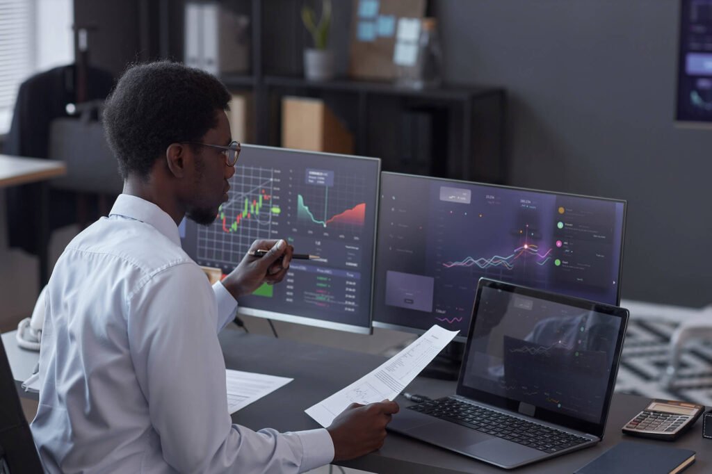 broker analyzing financial market in office 2023 11 27 04 56 50 utc